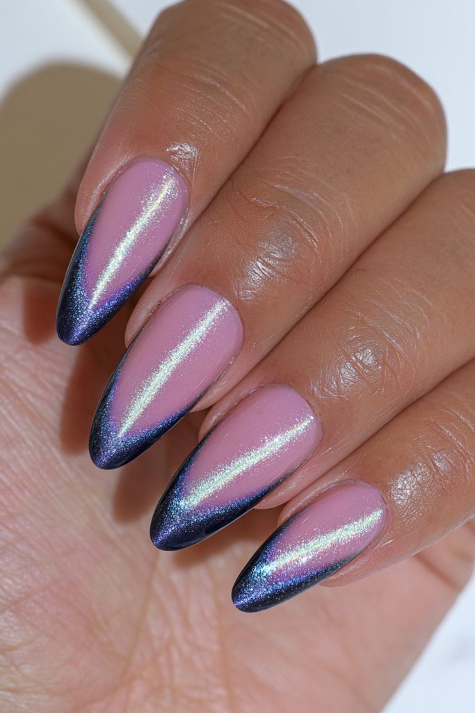 Deep navy cat-eye nails with luminous magnetic blue glow