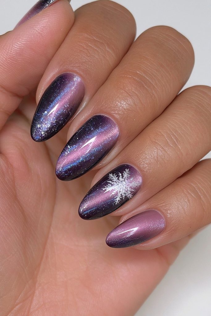 20 Glamorous Snowflake Nail Ideas to Sparkle Through Winter 4 Navy velvet snowflake statement nails