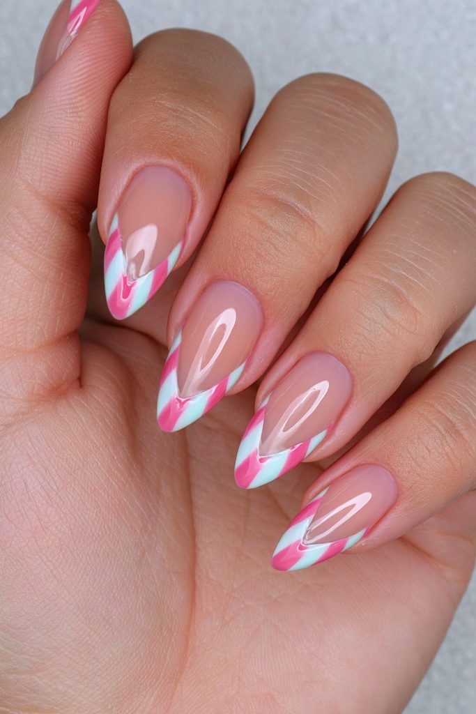 20 Candy Cane Nail Designs for Easy, Festive DIY Manicures 4 Negative-space candy cane tips