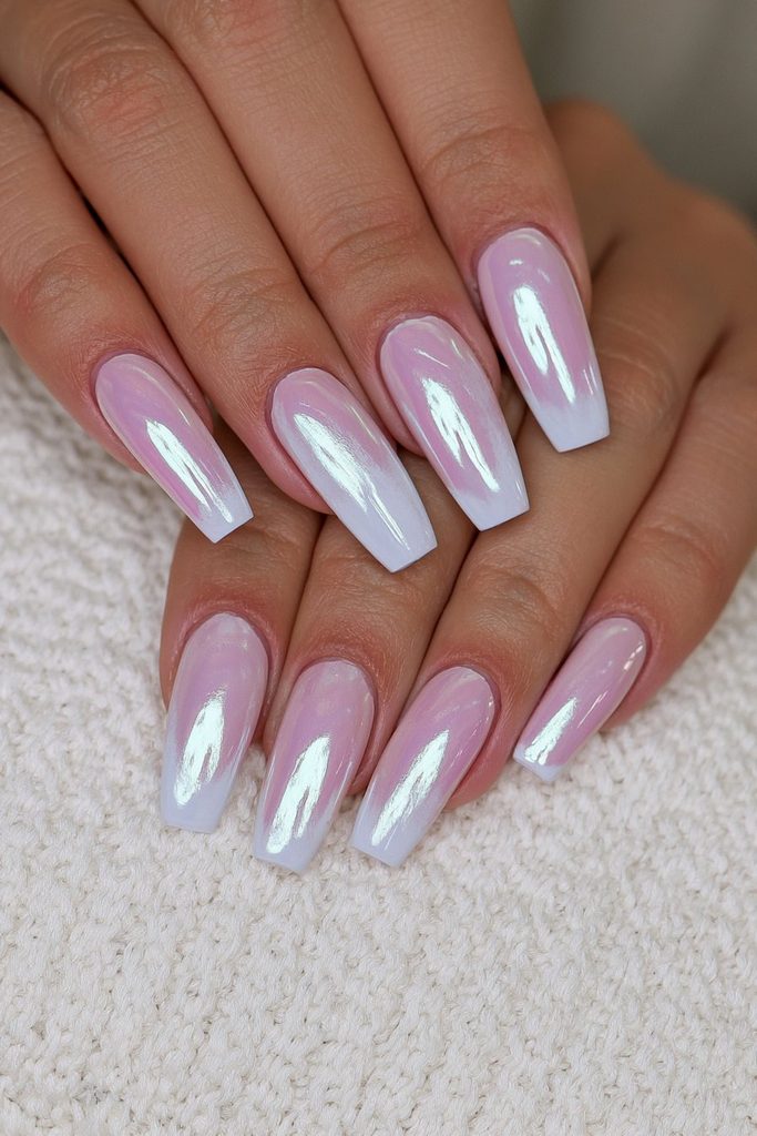 Periwinkle chrome coffin nails with cool luminous metallic finish