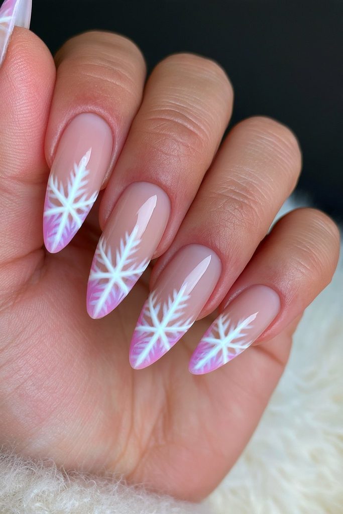 Negative space nails with reverse snowflake designs and clean details