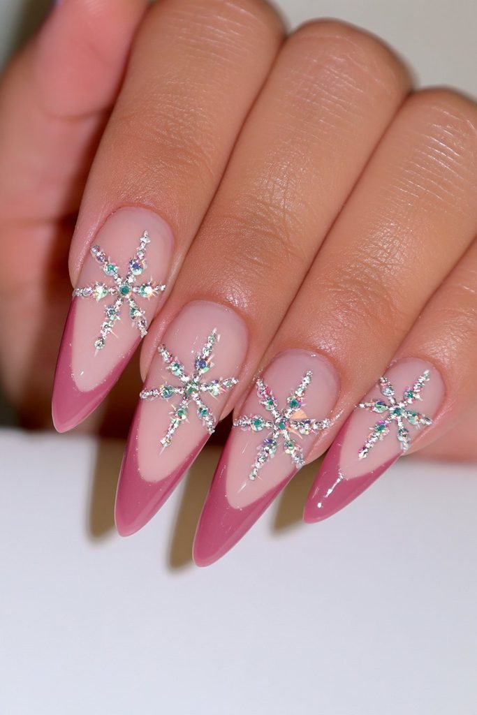 Rhinestone snowflake nails sparkling with glamorous crystal embellishments