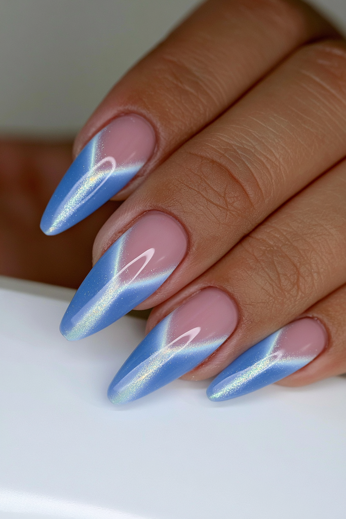 Sapphire blue cat-eye nails with deep luminous magnetic glow