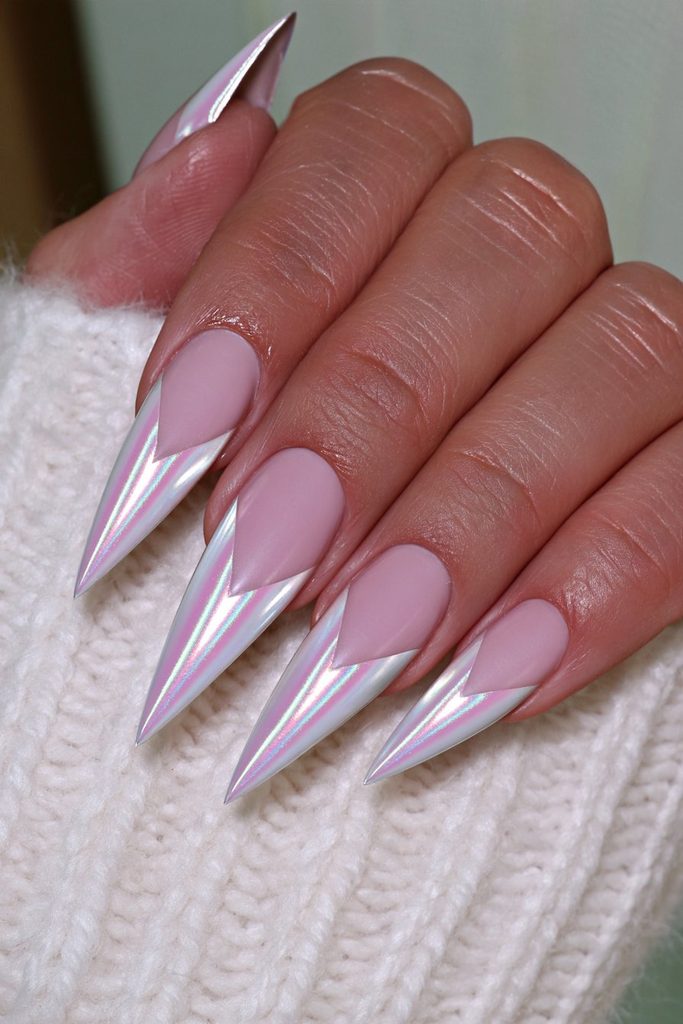 Silver chrome stiletto nails with striking mirror-like shine