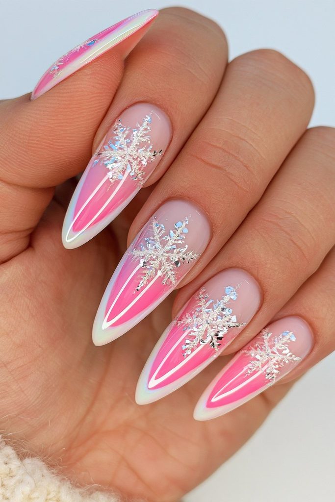 Silver foil snowflake nails with metallic accents and winter sparkle