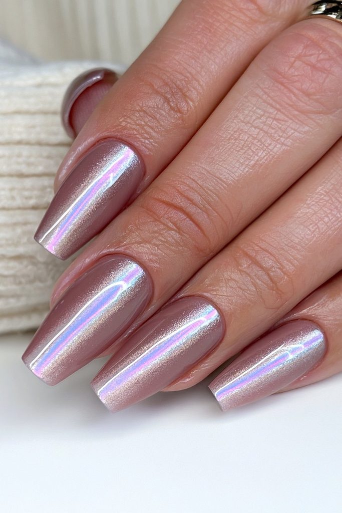 Smoky charcoal cat-eye nails with dark magnetic glow