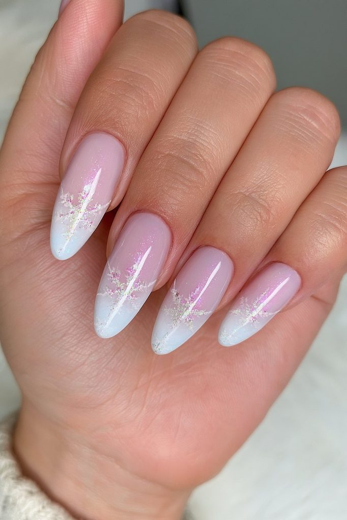 Stamped snowflake nails featuring repeating detailed winter patterns