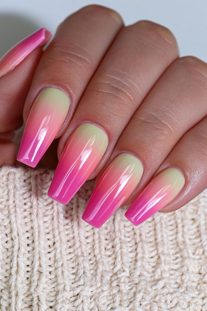 Sunset ombré coffin nails with warm glowing color transitions