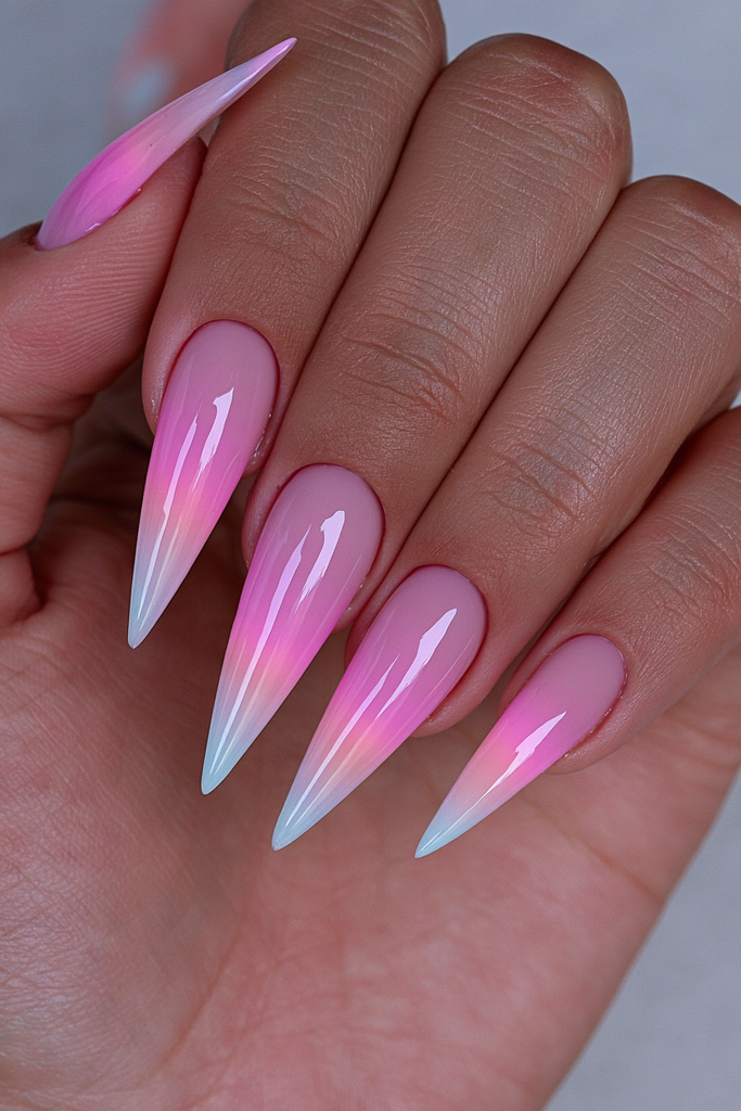 Sunset ombré stiletto nails with warm blended gradient colors