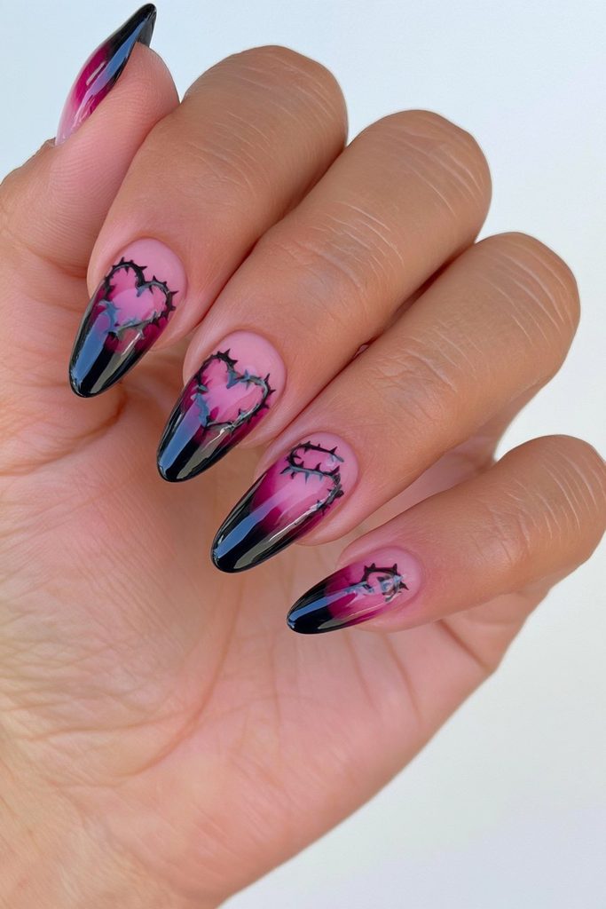 Thorned heart accent almond nails
