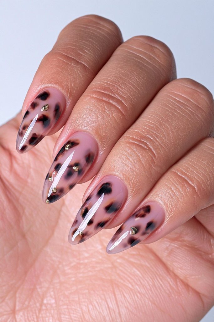 Tortoiseshell nails with gold studs