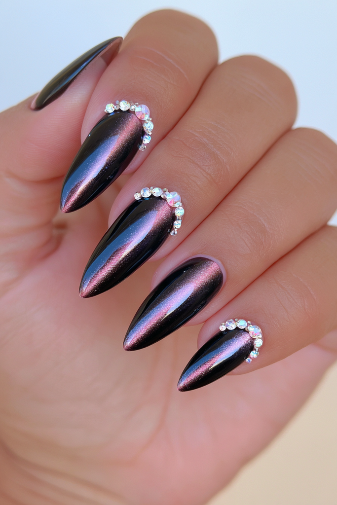 Black cat-eye rhinestone accent nails