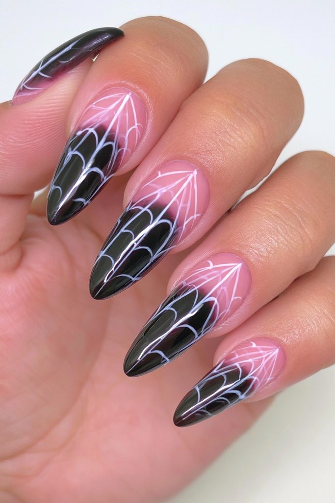 20 Spider Web Nail Ideas for a Spooky-Chic Halloween 1 White spider web black base nails