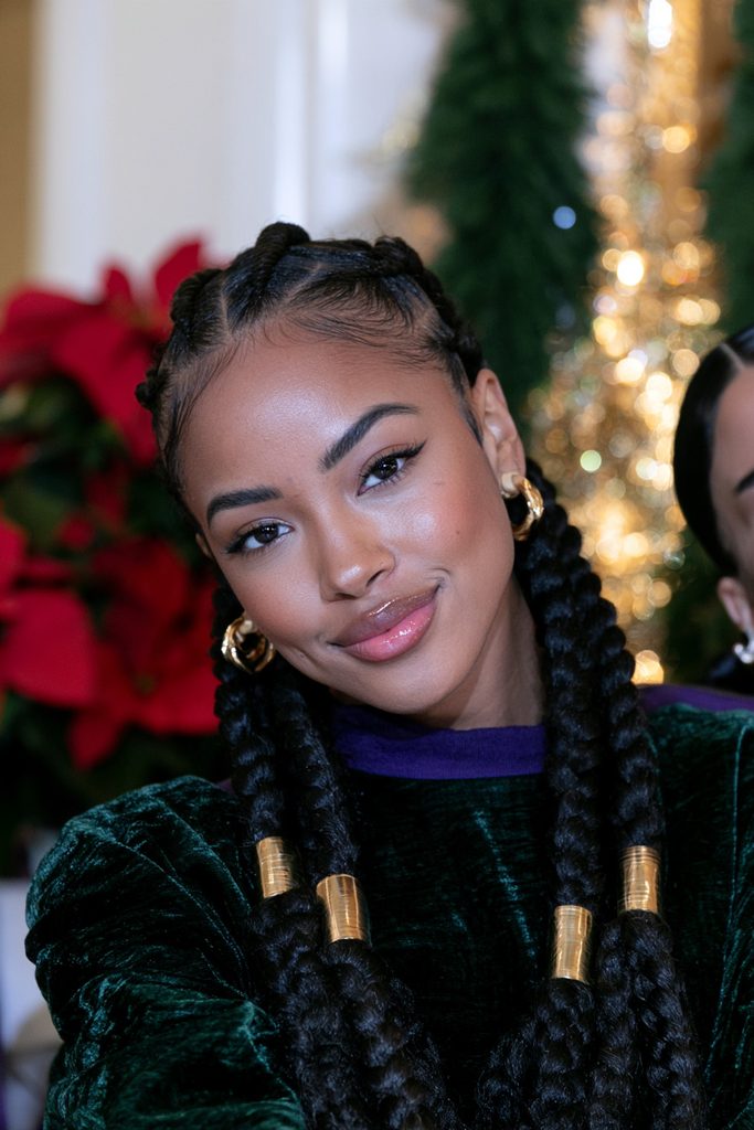 Cornrow braids gold cuffs Christmas hairstyle