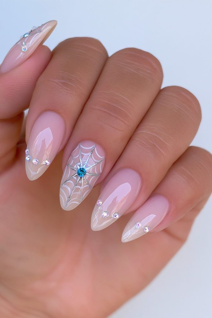 20 Spider Web Nail Ideas for a Spooky-Chic Halloween 18 Dewdrop rhinestone spider web nails