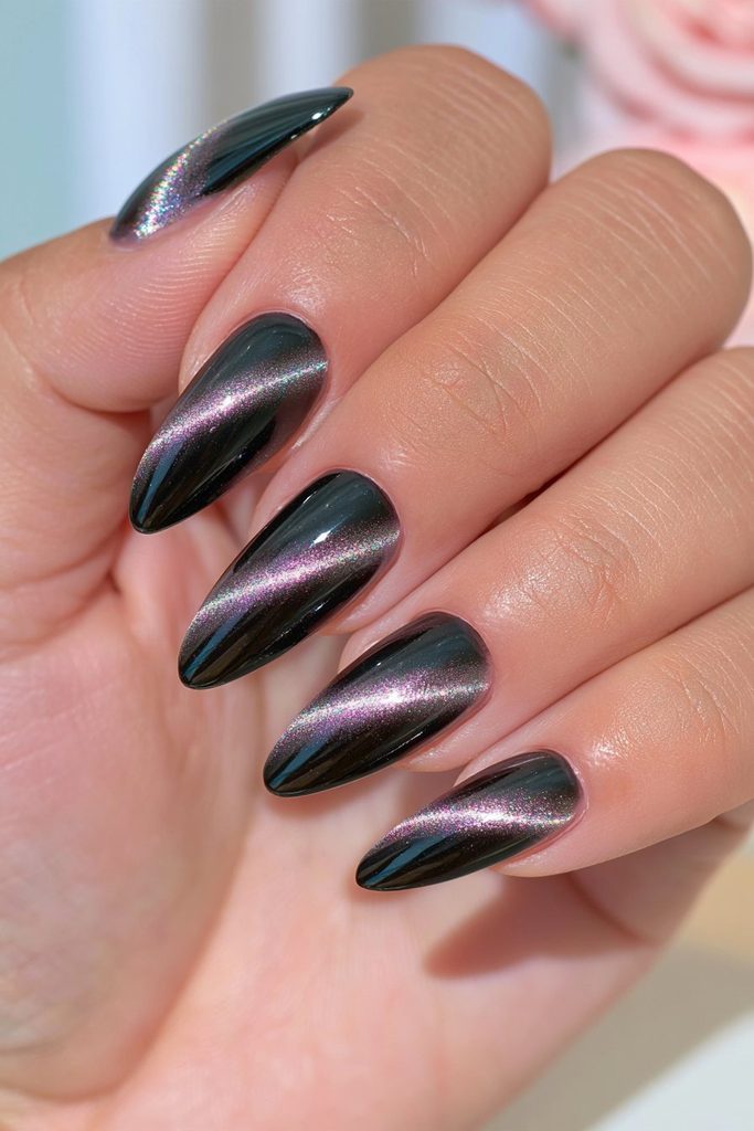 Diagonal black almond cat-eye nails