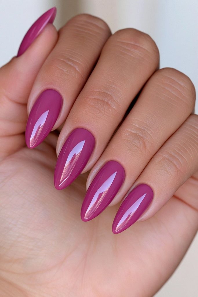 Glossy solid burgundy manicure nails