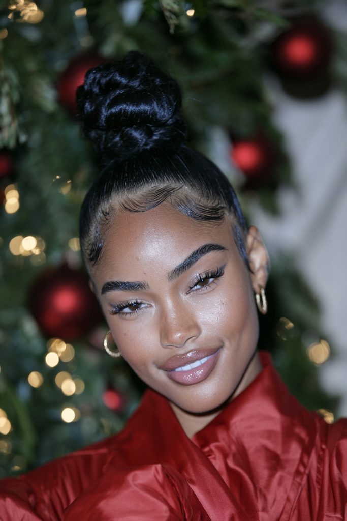 High bun styled baby hairs