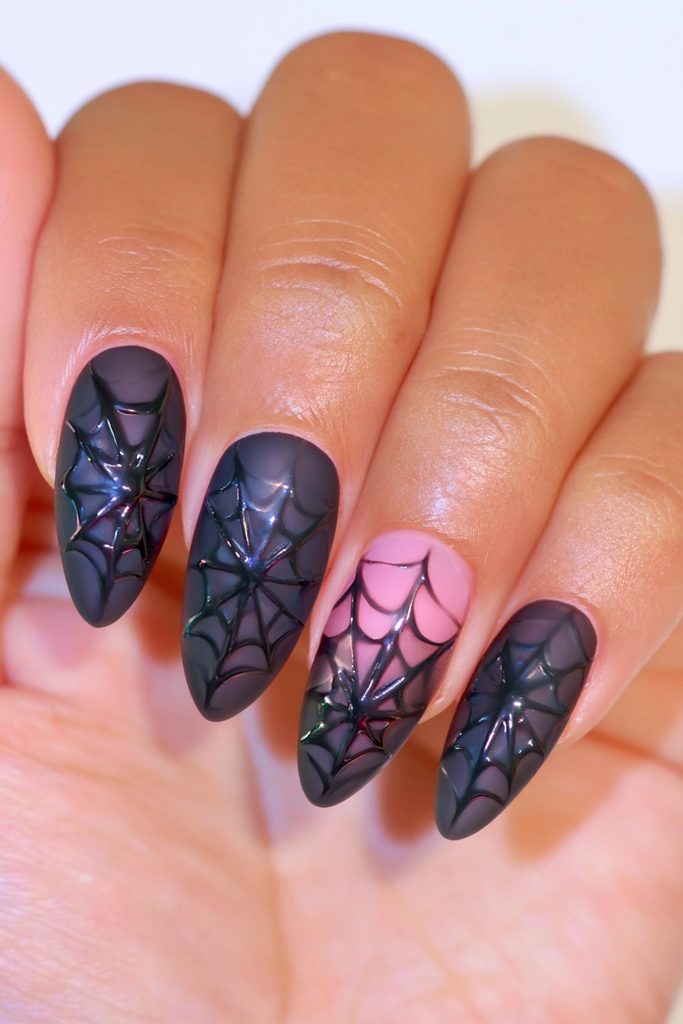 20 Spider Web Nail Ideas for a Spooky-Chic Halloween 5 Matte black glossy web accent nails