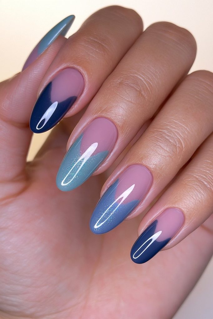 22 Coraline Nails That Are Subtle Enough for Everyday Wear 14 Navy teal skittle manicure nails