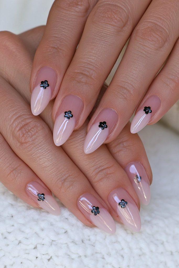 22 Coraline Nails That Are Subtle Enough for Everyday Wear 7 Negative space button detail nails
