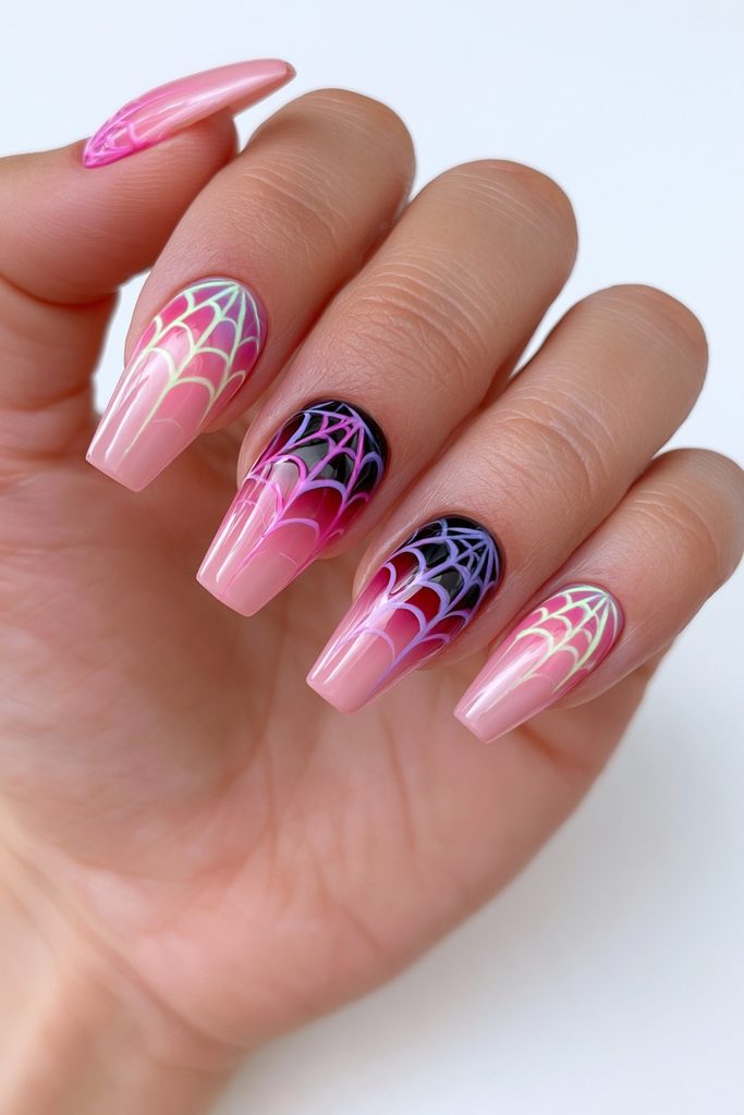 20 Spider Web Nail Ideas for a Spooky-Chic Halloween 8 Neon spider web glow nails