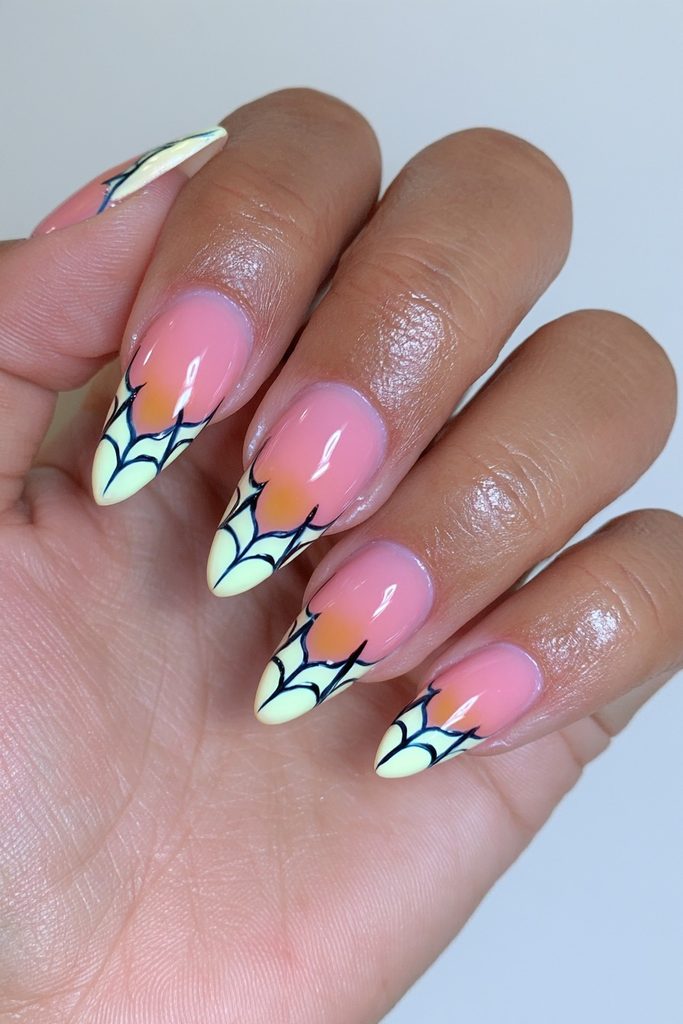 20 Spider Web Nail Ideas for a Spooky-Chic Halloween 7 Orange spider web Halloween nails