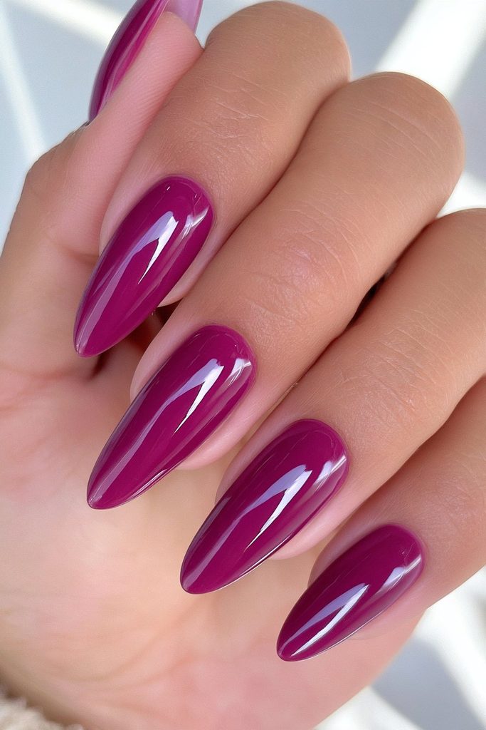 Oxblood almond shaped manicure nails