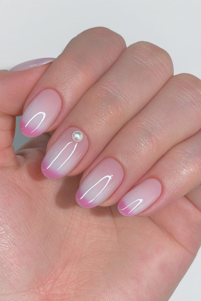 Single pearl nude accent nails