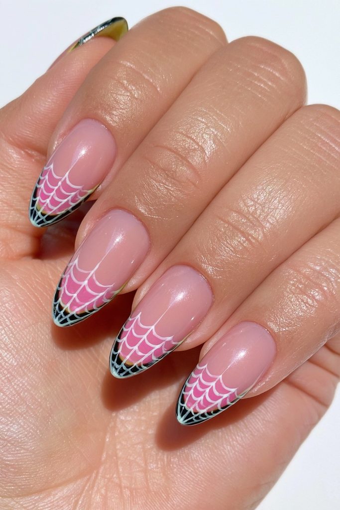 20 Spider Web Nail Ideas for a Spooky-Chic Halloween 2 Single spider web accent nail