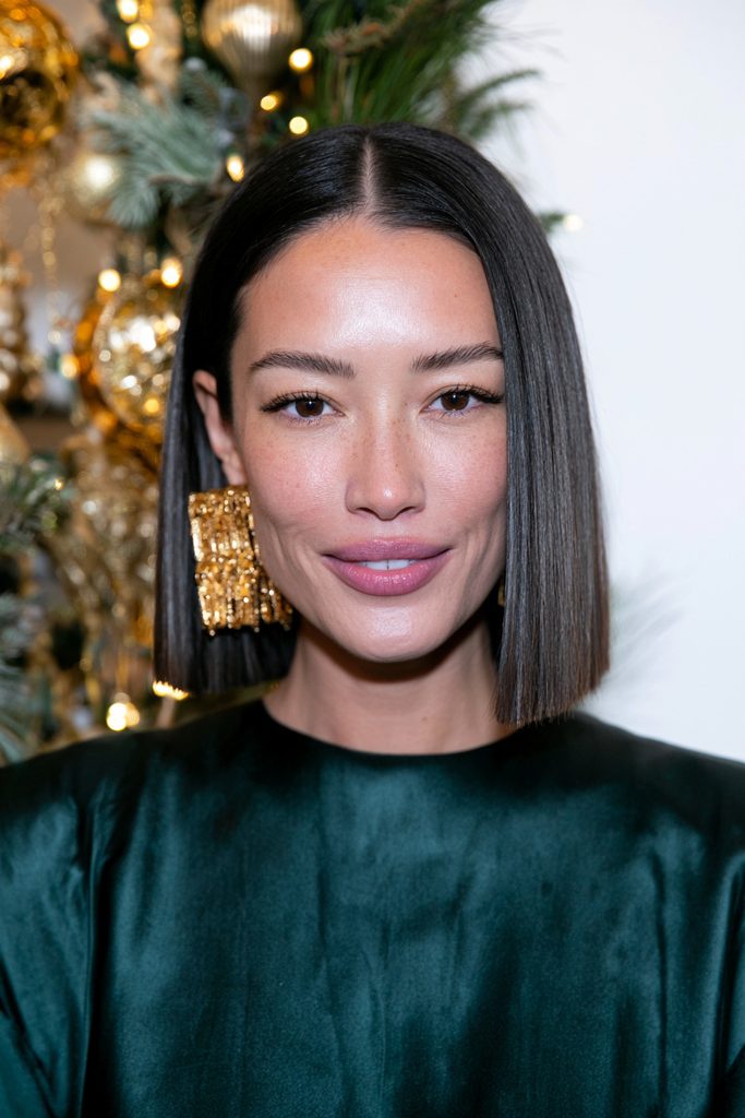 Tucked bob statement earrings hairstyle