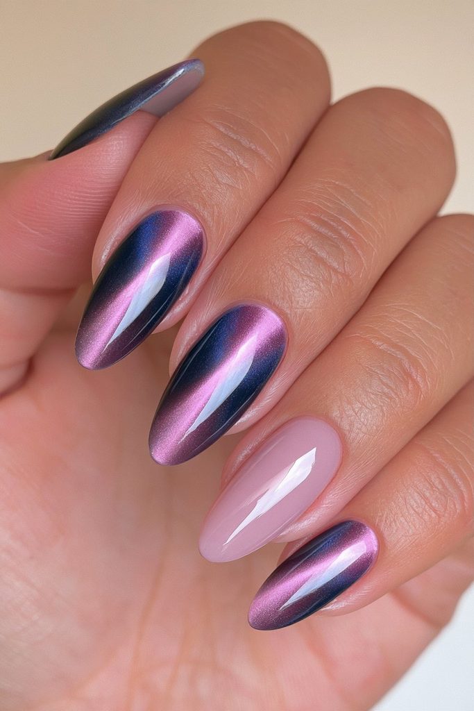 22 Coraline Nails That Are Subtle Enough for Everyday Wear 5 Navy cat-eye shimmer nails